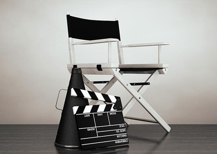 Director's chair, megaphone and movie clapper